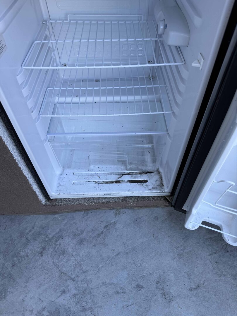 Dirty refrigerator before professional deep cleaning service Santa Clara CA
